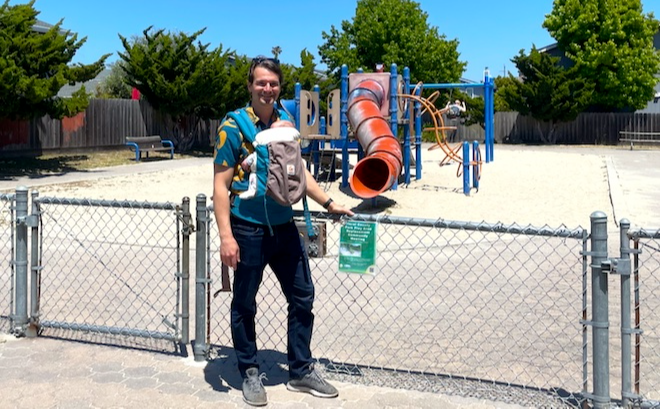 image of Manu in front of Floral Park playground