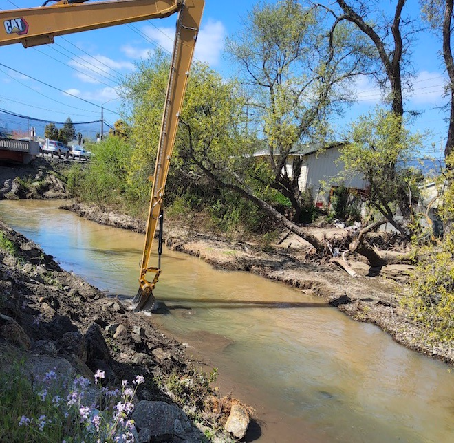 photo of a creek being cleared in south county